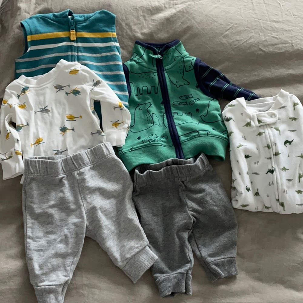 2 Carter’s sets with vest